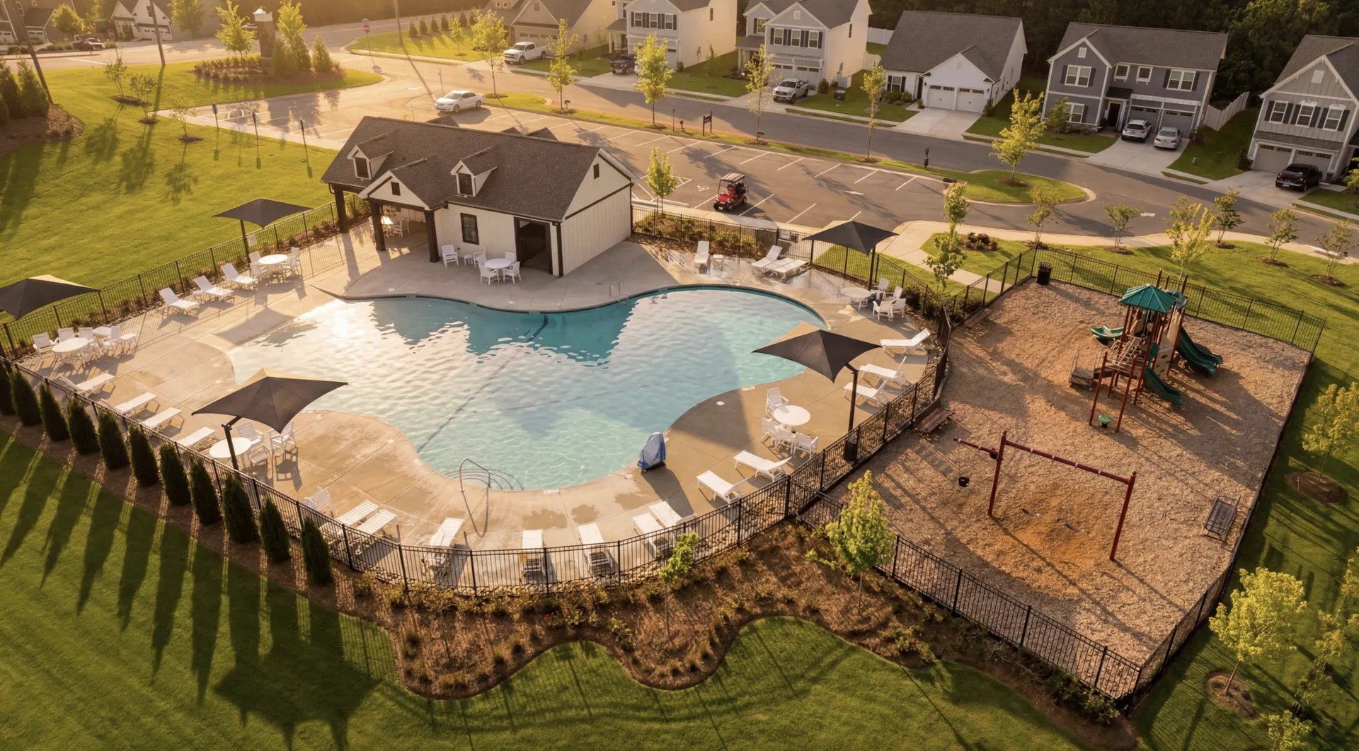 Pool and playground at The Groves amenity area