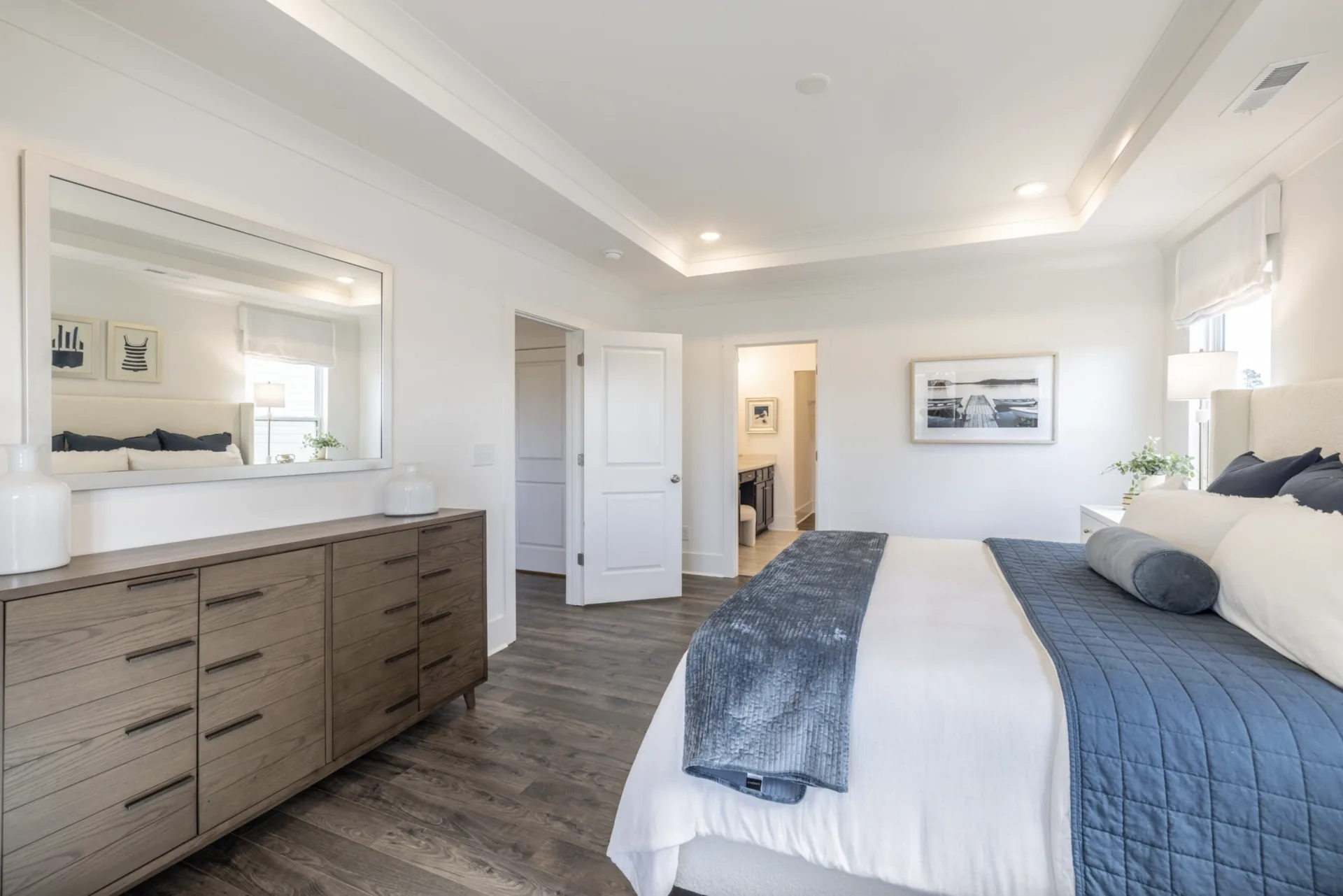 Primary bedroom with tray ceiling in the Montcrest 1755