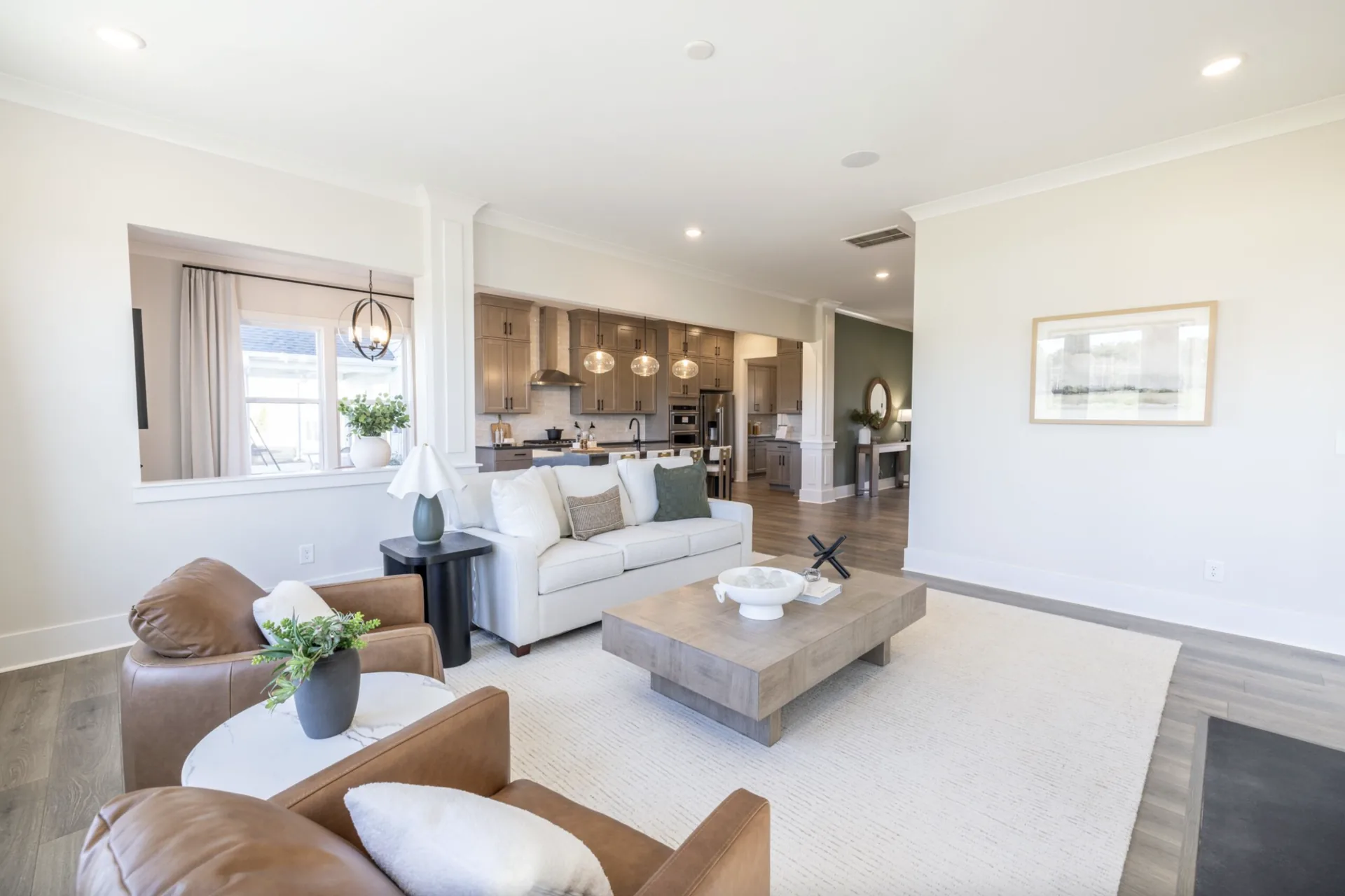 Great room open to the kitchen in the Winslow